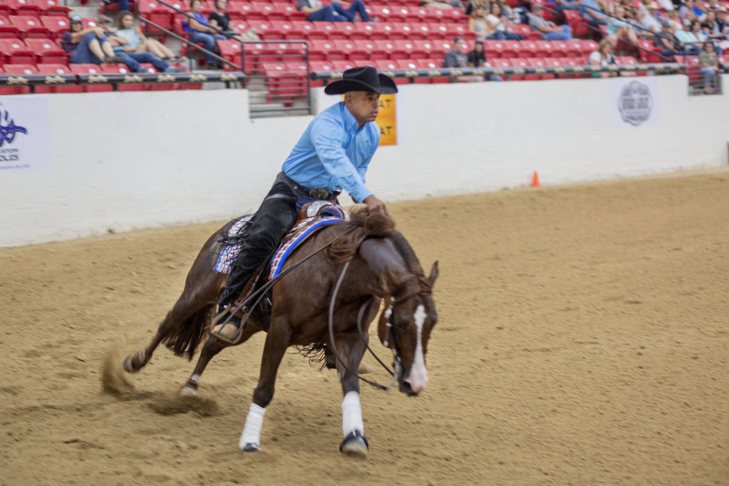 Reining expert Matt Mills practices his reining pattern at the South Point Arena in Las Vegas o ...