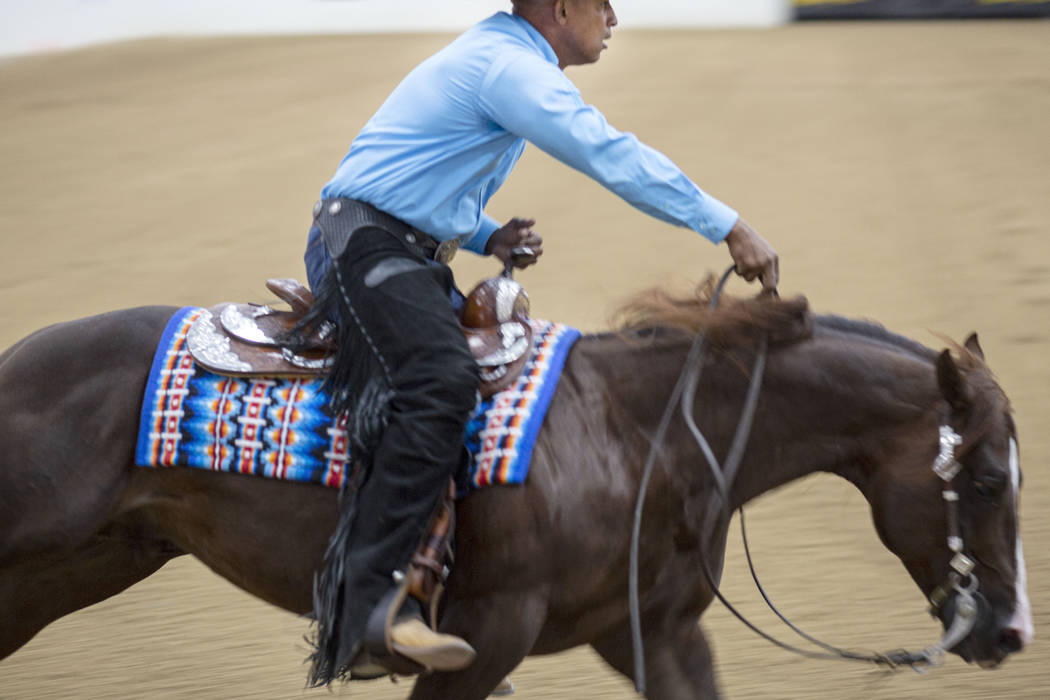 Reining expert Matt Mills practices his reining pattern at the South Point Arena in Las Vegas o ...