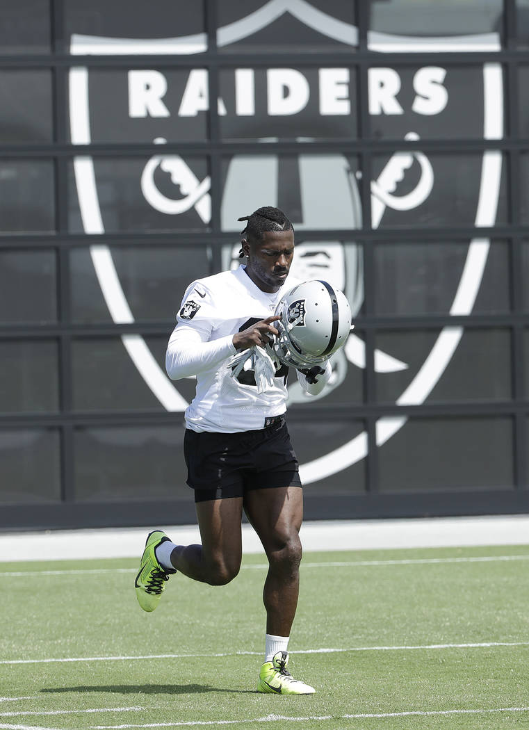 Oakland Raiders wide receiver Antonio Brown runs during an official team activity at the headqu ...