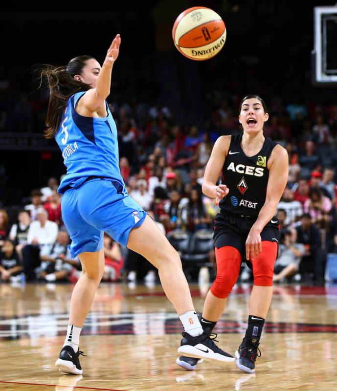 Las Vegas Aces' Kelsey Plum sends the ball past Atlanta Dream's Maite Cazorla (5) during the se ...