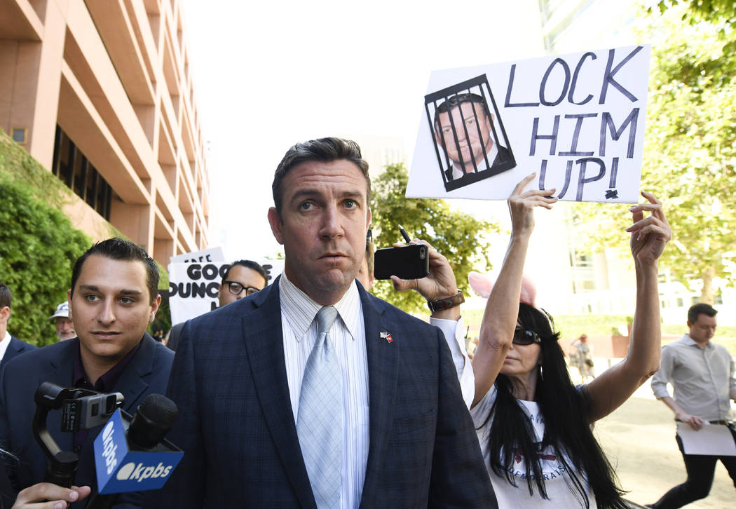 FILE - In this July 1, 2019, file photo, U.S. Rep. Duncan Hunter, R-Calif., leaves federal cour ...