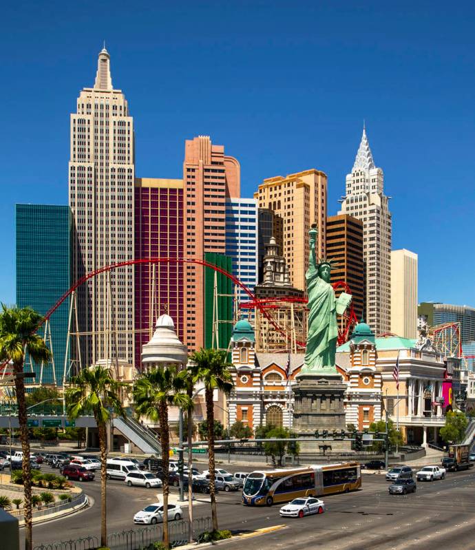 An RTC bus passes New York-New York driving down the Strip on Tuesday, Aug. 13, 2019 in Las Veg ...