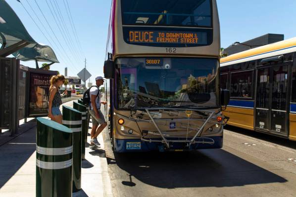 Passengers board an RTC bus near the Tropicana on the Strip on Tuesday, Aug. 13, 2019 in Las Ve ...