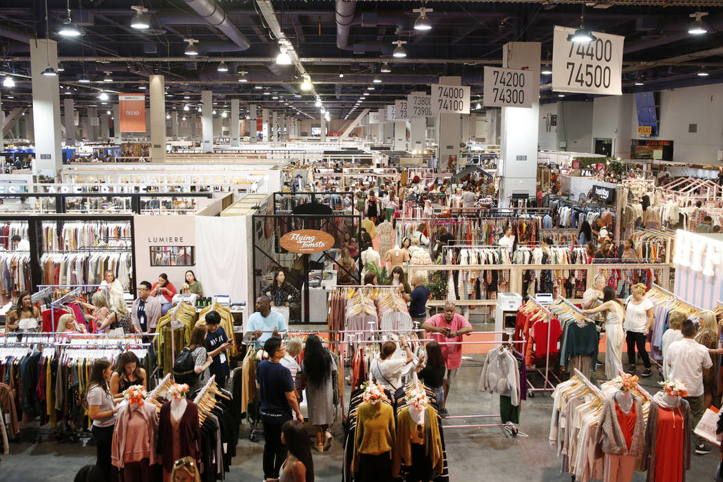 Attendees walk the show floor during the second day of the MAGIC trade show at the Las Vegas Co ...