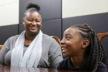 Suddenly Crosby, left, smiles with her daughter Jaraya, 7, at Mountain View Christian School in ...