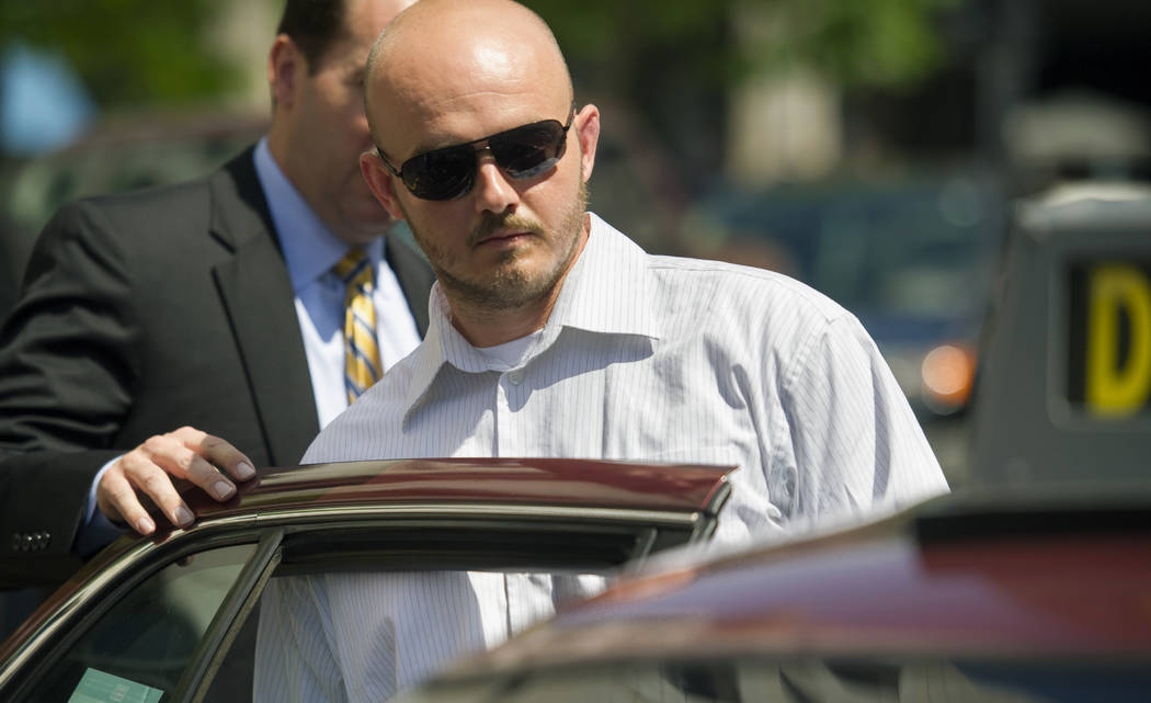 In a June 11, 2014, file photo, former Blackwater Worldwide guard Nicholas Slatten enters a tax ...