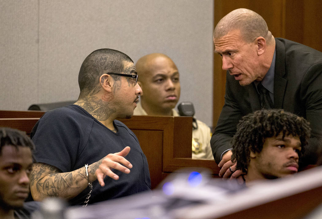 Andrew Arevalo talks with criminal defense attorney Dan Gilliam before his sentencing at the Re ...