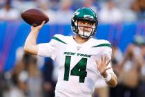 New York Jets quarterback Sam Darnold throws a pass during the first half of the team's preseas ...