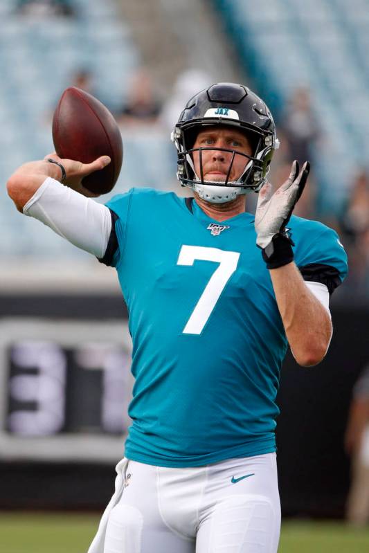 Jacksonville Jaguars quarterback Nick Foles (7) warms up before the first half of an NFL presea ...