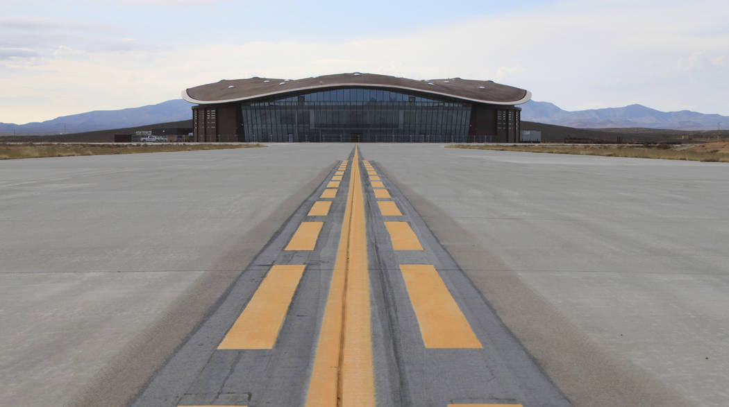 FILE - This Dec. 9, 2014 photo shows the taxiway leading to the hangar at Spaceport America in ...