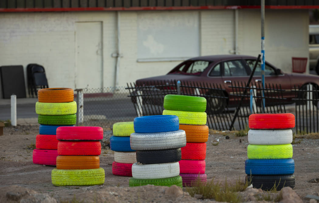 Seven Magic Tires art installation created by Ramiro Gomez and Justin Favela at 1000 N. Nellis ...