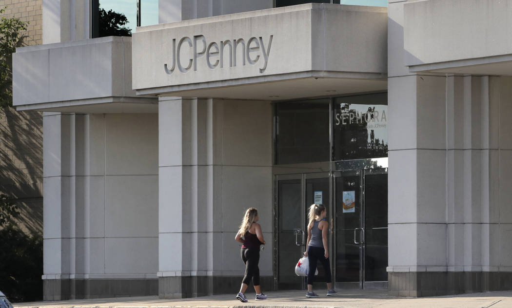 In this Wednesday, Aug. 14, 2019, photo two women walk into the JCPenney store in Peabody, Mass ...