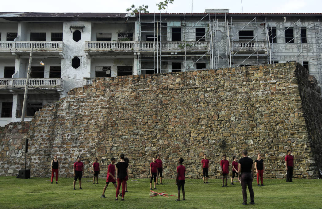 In July 28, 2019 photo, actors perform in front of the old wall that protected the Casco Viejo ...