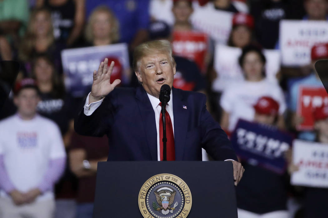 President Donald Trump speaks at a campaign rally, Thursday, Aug. 15, 2019, in Manchester, N.H. ...