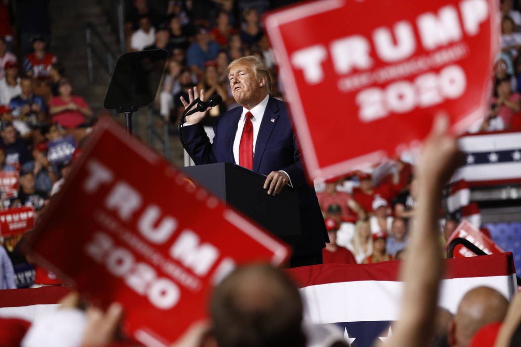 President Donald Trump speaks at a campaign rally, Thursday, Aug. 15, 2019, in Manchester, N.H. ...