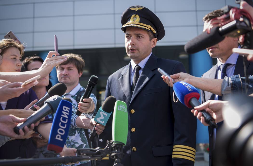 Damir Yusupov, 41-year-old Russian pilot, speaks to the media in Yekaterinburg, Russia, Friday, ...