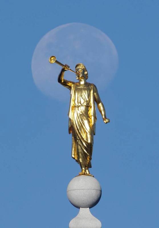 FILE - In this Sept. 11, 2014, file photo, the angel Moroni statue sits atop the Salt Lake Temp ...