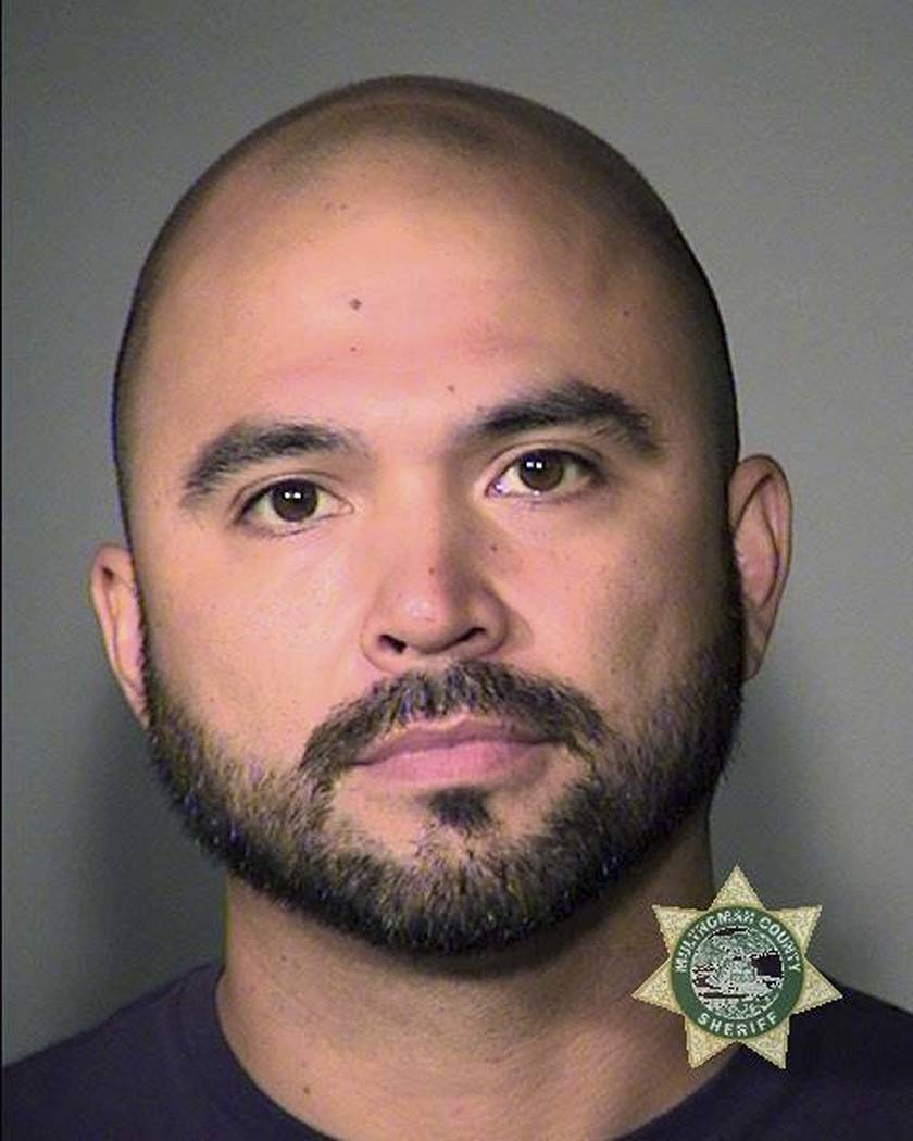 This booking photo provided by the Multnomah County Sheriff's Office shows Patriot Prayer leade ...