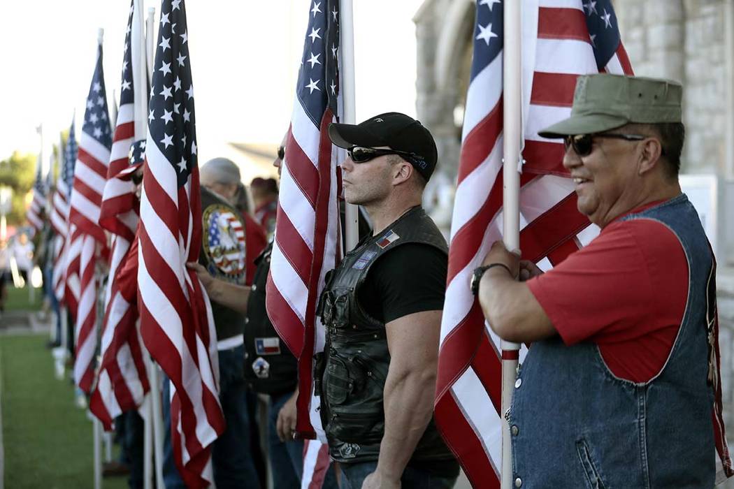 Veterans groups line the sidewalk outside Margie Reckard's funeral at La Paz Faith Memorial &am ...