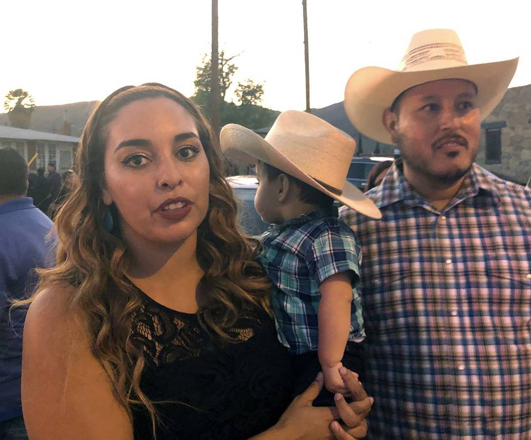 Isabel Regalado, 27, left, her son, Preston Regalado-Soliz, 10-months, and her husband, Esteban ...