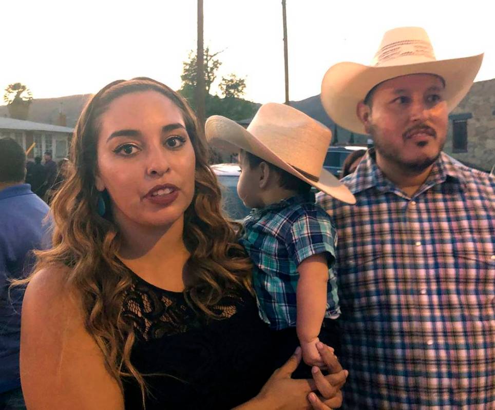 Isabel Regalado, 27, left, her son, Preston Regalado-Soliz, 10-months, and her husband, Esteban ...