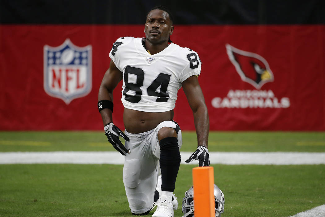 Oakland Raiders wide receiver Antonio Brown (84) warms up prior to an NFL football game against ...