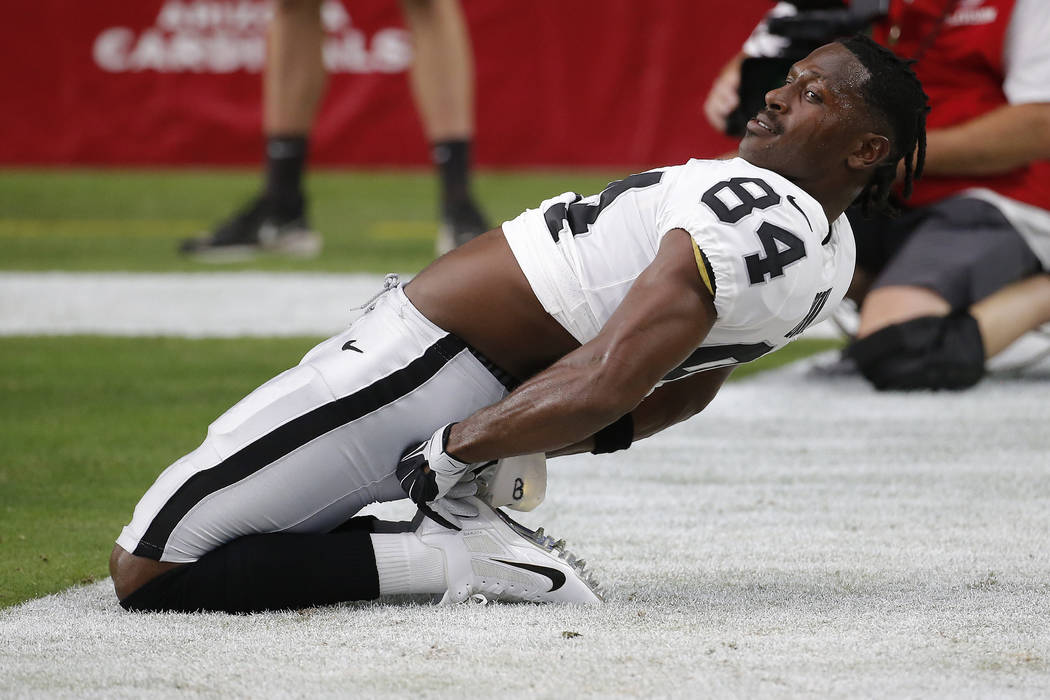 Oakland Raiders wide receiver Antonio Brown (84) warms up prior to an NFL football game against ...