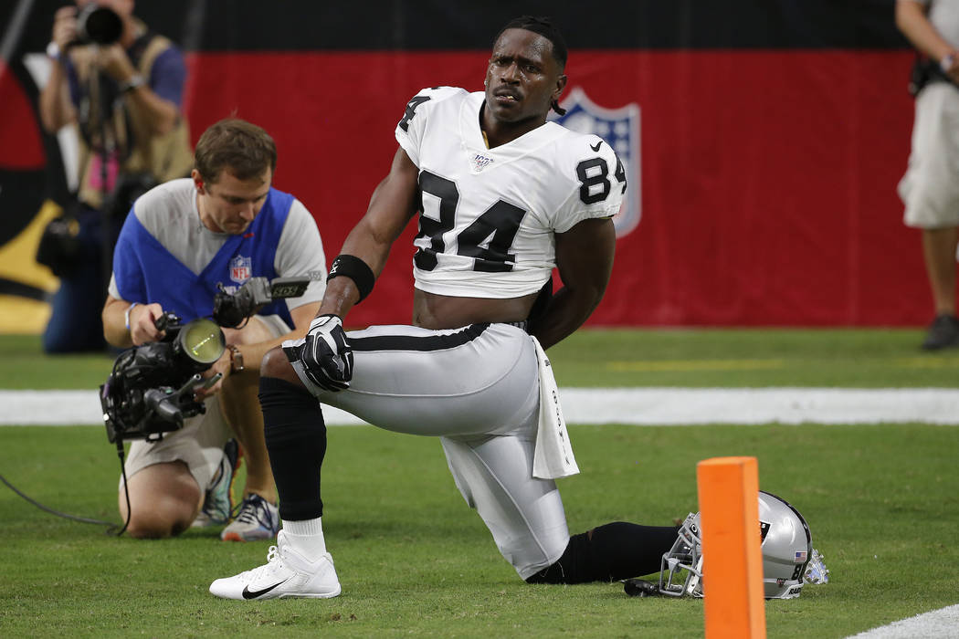 Oakland Raiders wide receiver Antonio Brown (84) warms up prior to an NFL football game against ...