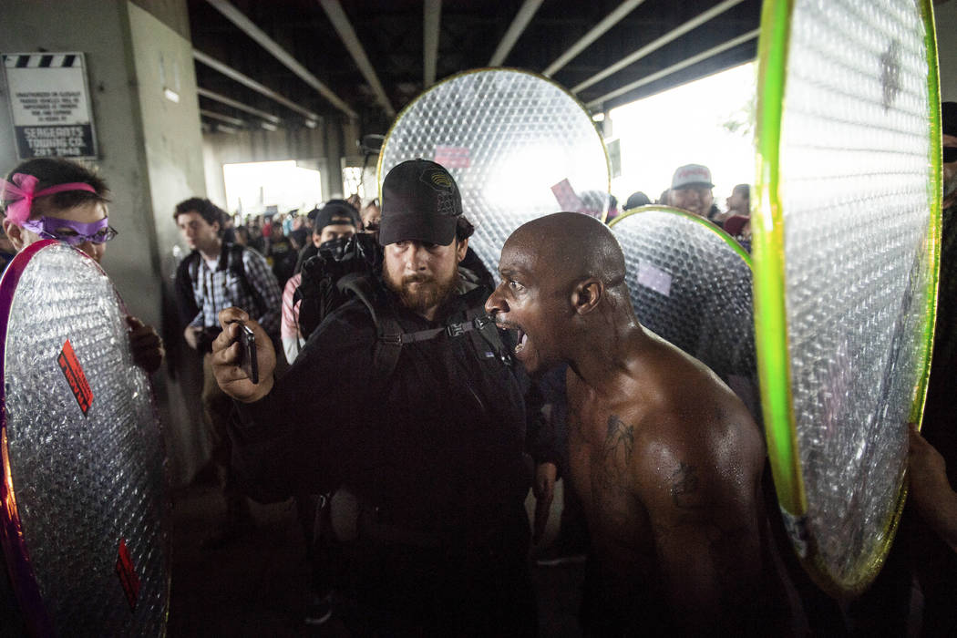 A man yells as right-wing demonstrators and counter-protesters gather in Tom McCall Waterfront ...