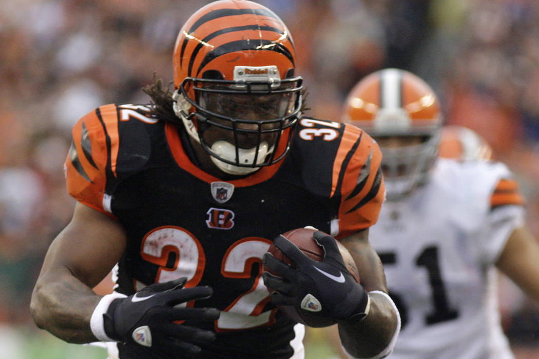 FILE - In this Nov. 27, 2011 file photo Cincinnati Bengals running back Cedric Benson runs for ...