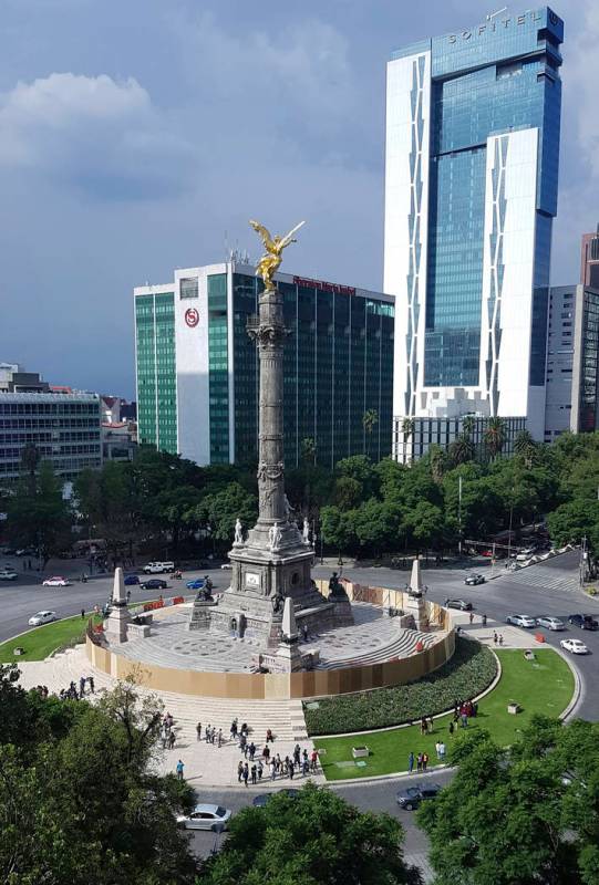 Mexican officials cordon off the iconic Angel of Independence monument after protesters defaced ...