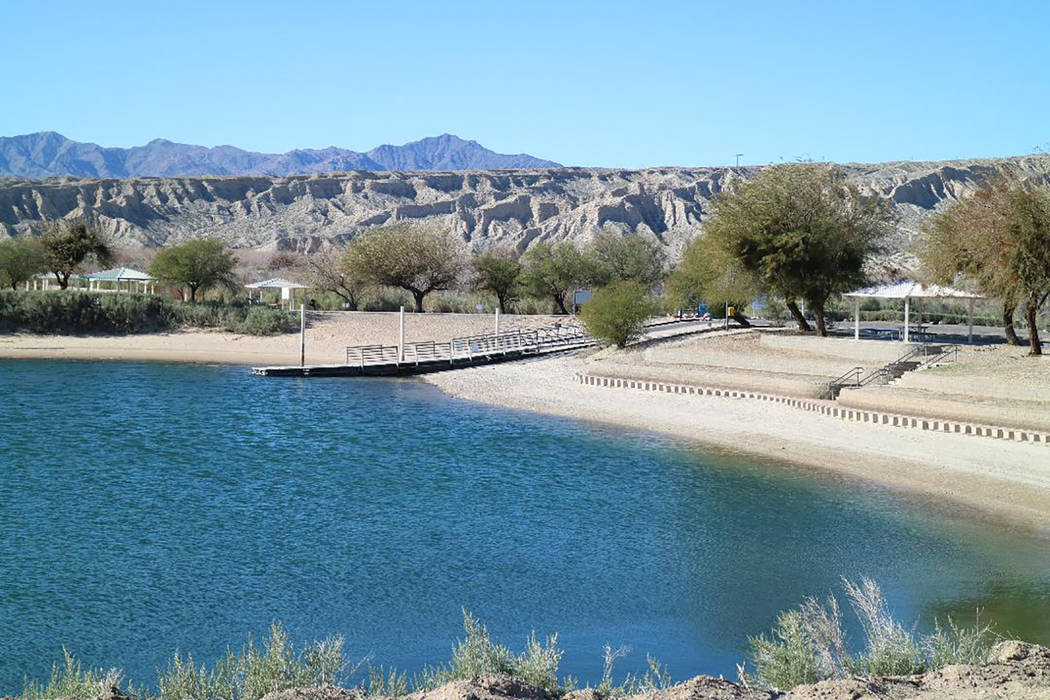 A wide lagoon with a sandy beach can be found at Big Bend of the Colorado State Recreation Area ...