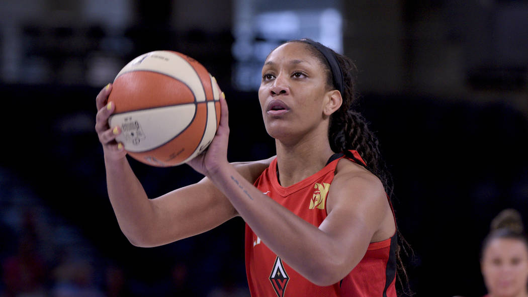 Las Vegas Aces' A'ja Wilson takes a free throw during the first half a WNBA basketball game aga ...