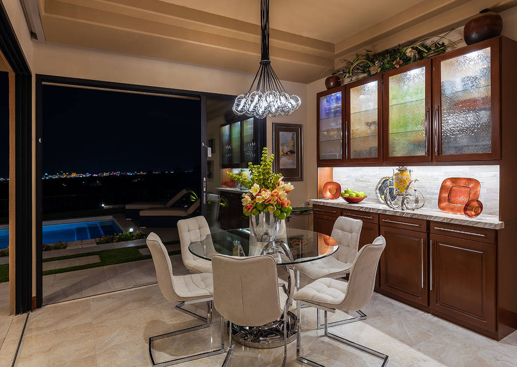 A breakfast nook looks out to the pool. (David Reisman Real Estate Millions)