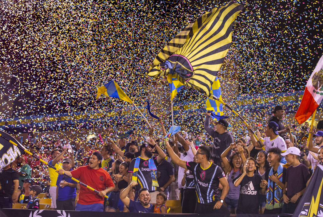 Las Vegas Lights FC fans are bathed in confetti as the team scores over the Portland Timbers 2 ...