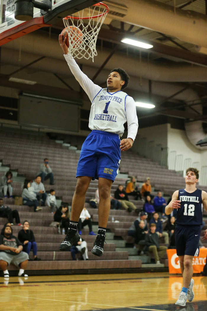 Trinity's Daishen Nix (1) jumps for a layup and a score against Foothill in the Las Vegas Prep ...