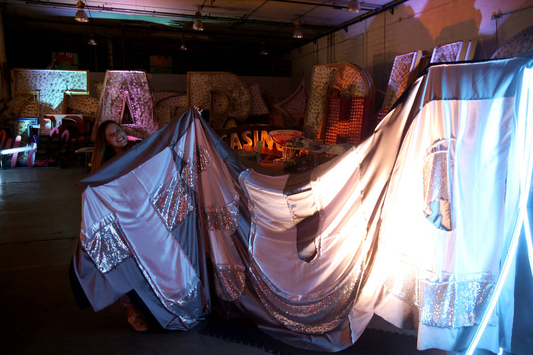 Julie Henson, artist in residence for the Neon Museum, shows one of her sculptures in progress ...