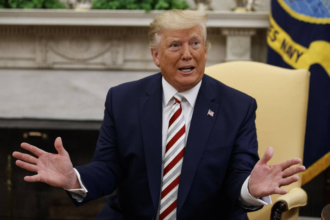 President Donald Trump speaks during a meeting with Romanian President Klaus Iohannis in the Ov ...