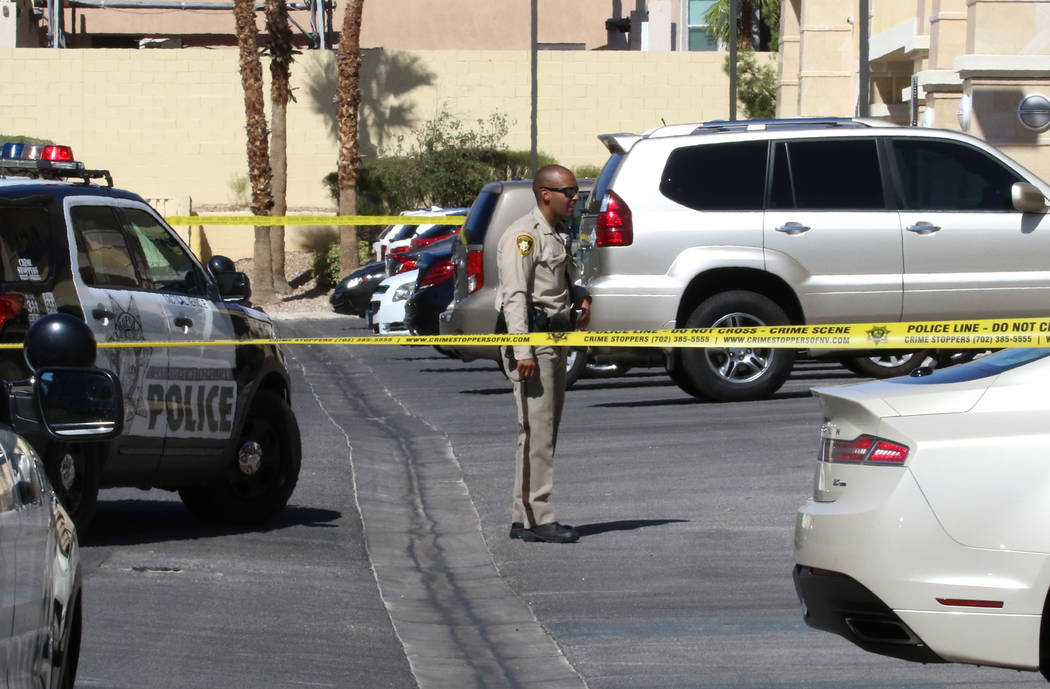 Las Vegas police are investigating after an officer shot at a dog after it charged at police, W ...