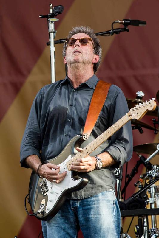 Eric Clapton performs during the New Orleans Jazz & Heritage Festival on April 27, 2014, in ...