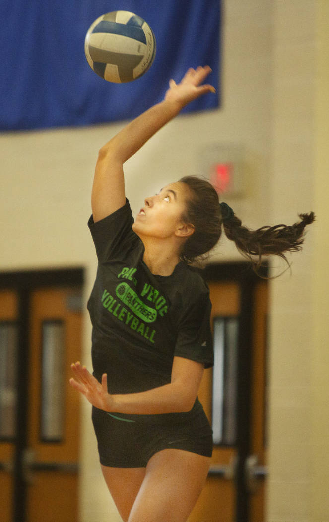 Alex Elliot, 17, senior, spikes the ball during volleyball practice at Palo Verde High School o ...