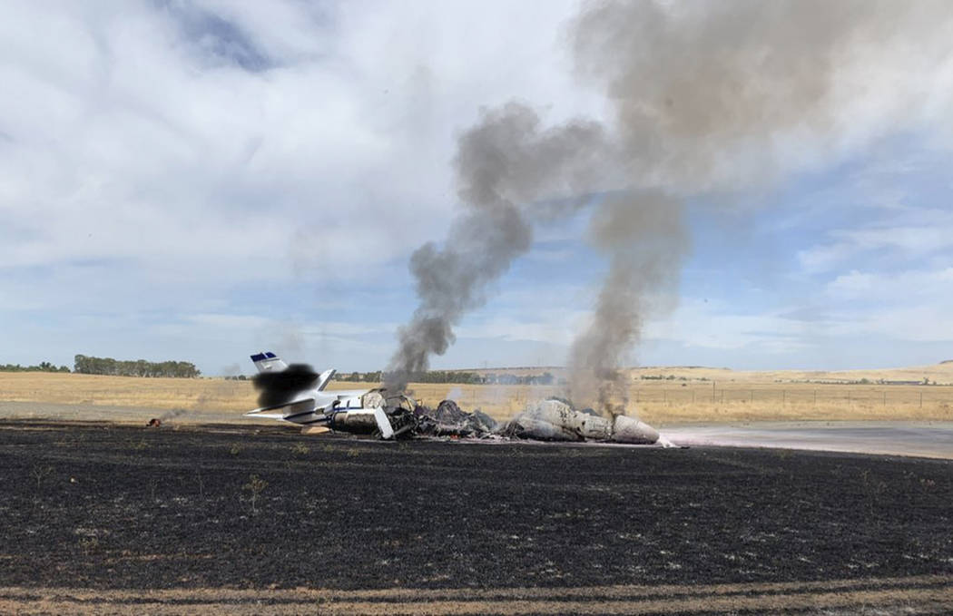 In this photo provided by the California Highway Patrol is the scene where a jet burst into fla ...