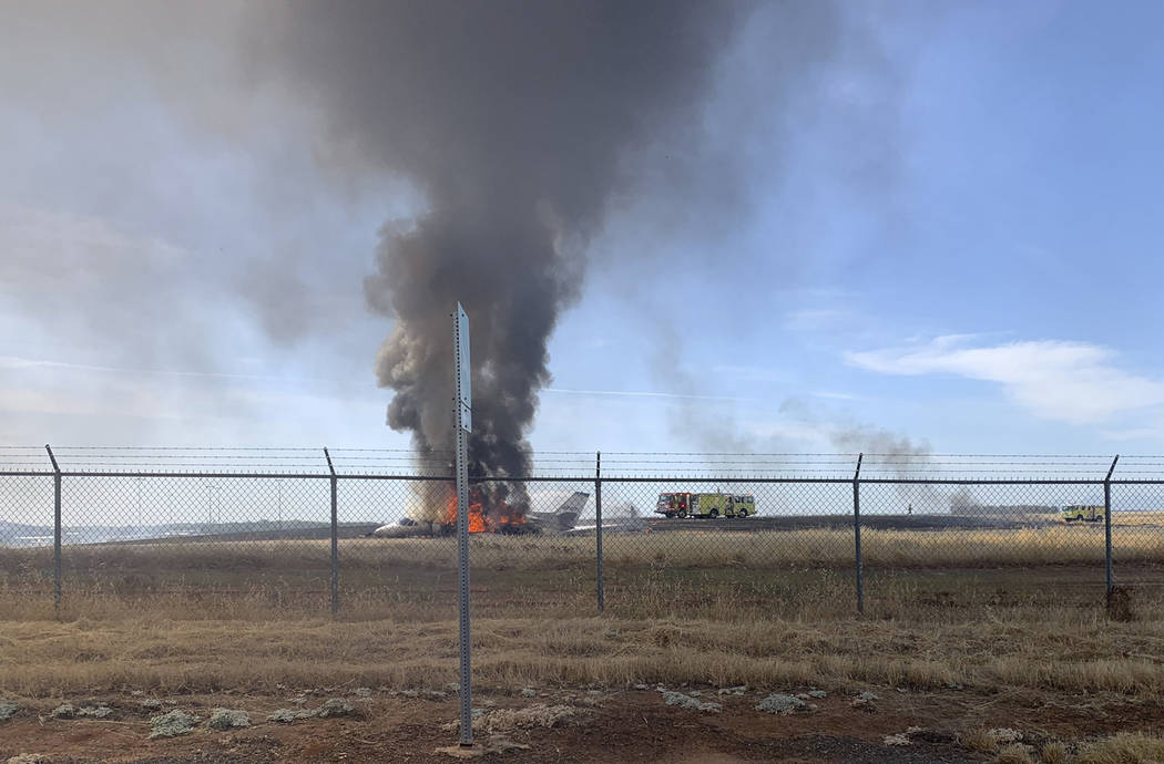 In this photo provided by the California Highway Patrol is the scene where a jet burst into fla ...