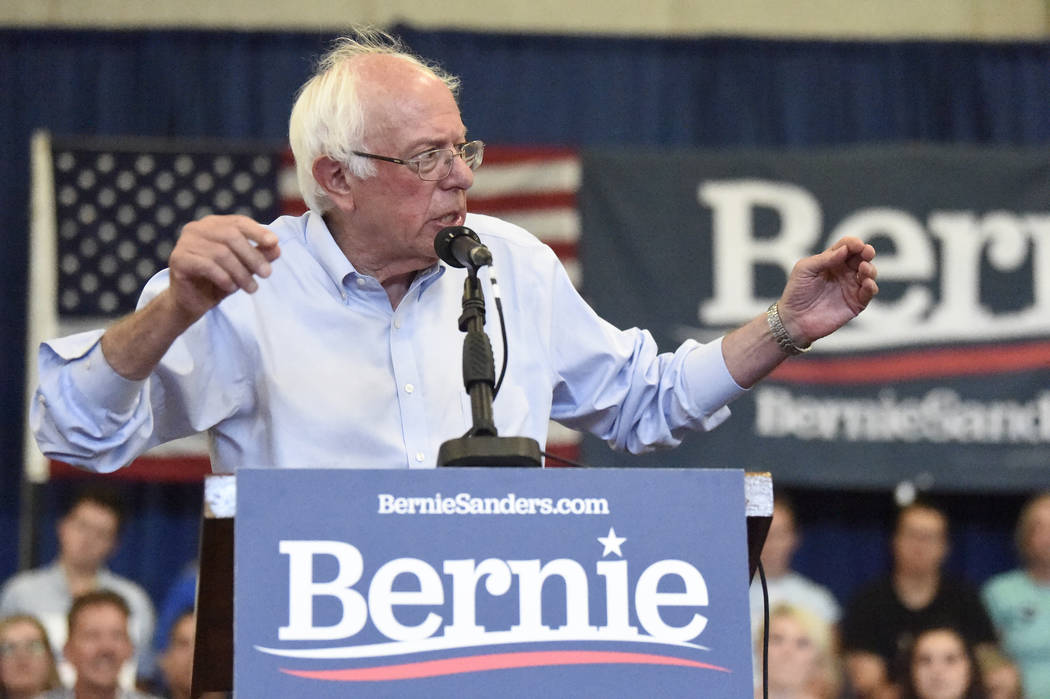 Democratic presidential hopeful Bernie Sanders speaks at the beginning of a town hall meeting t ...