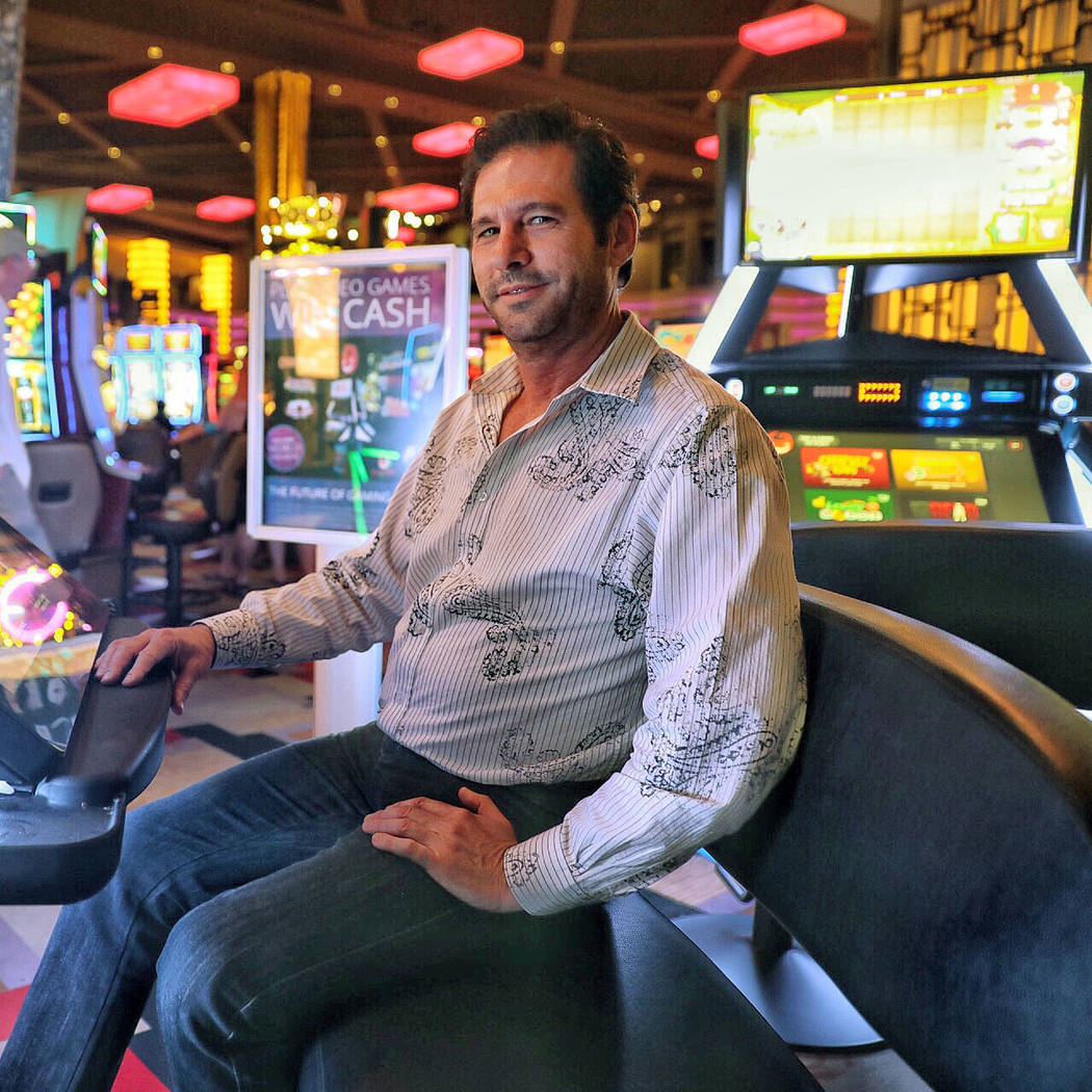 Gamblit CEO Eric Meyerhofer alongside a Model G machine at Planet Hollywood in Las Vegas on Tue ...