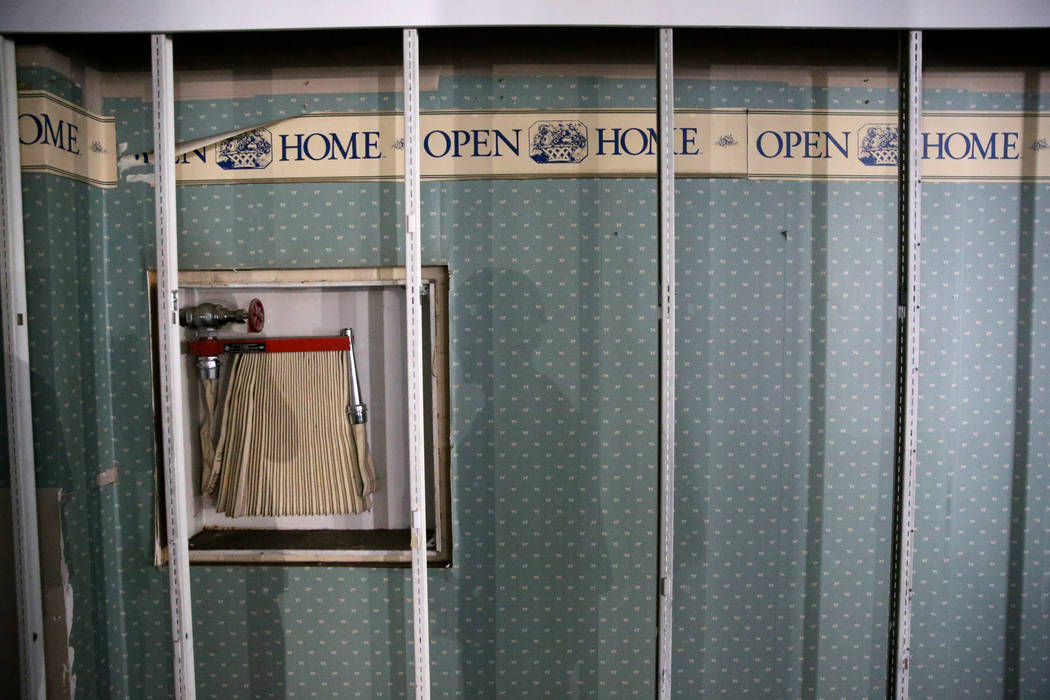 A fire hose found behind a wall inside the former Sears store is shown at the Boulevard Mall in ...