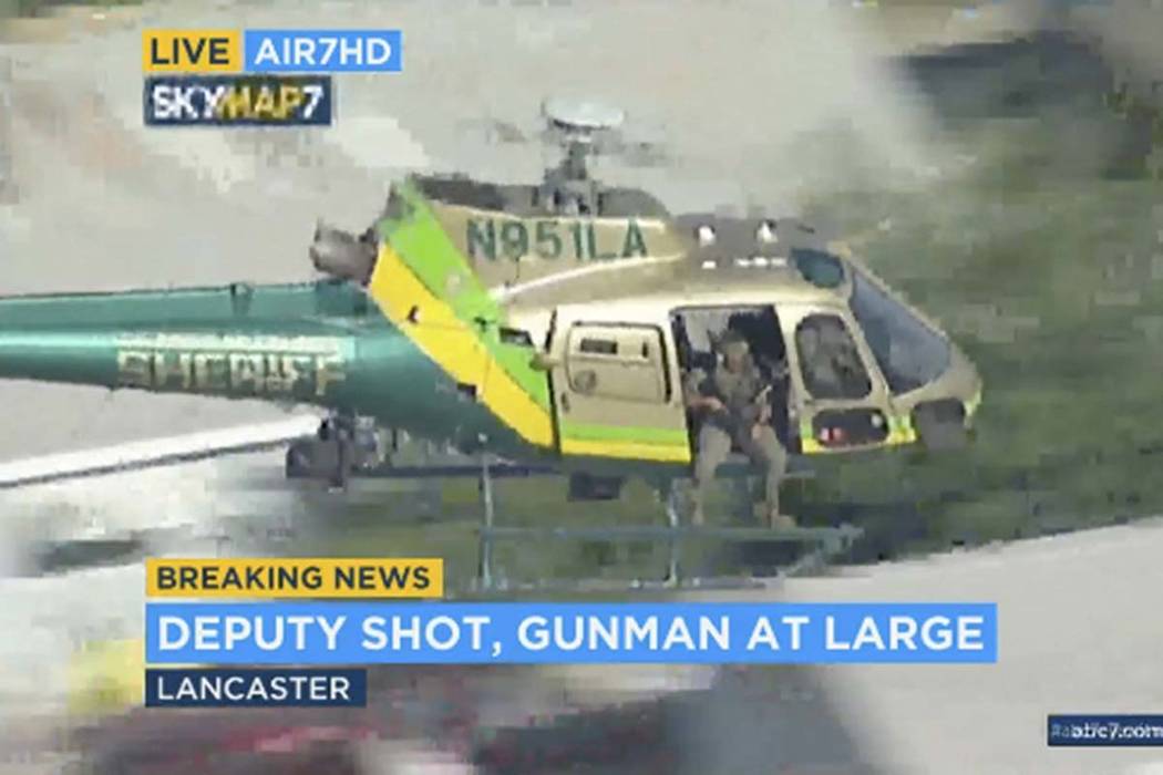 This photo taken from video provided by KABC-TV shows a sheriff's department helicopter with a ...