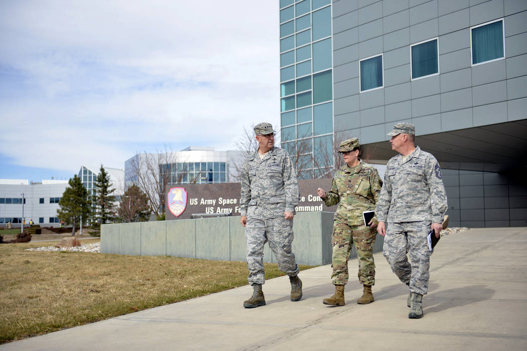 In this image provided by the U.S. Army National Guard, U.S. Air Force Gen. John E. Hyten, left ...