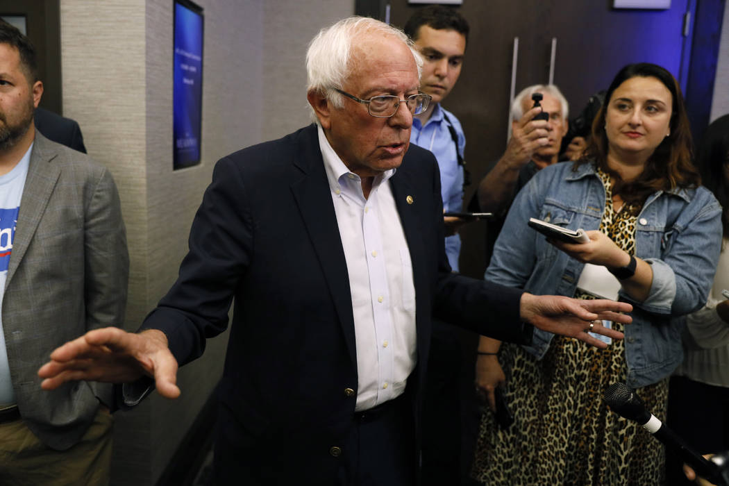 Democratic presidential candidate Sen. Bernie Sanders, I-Vt., speaks to reporters at the Iowa F ...