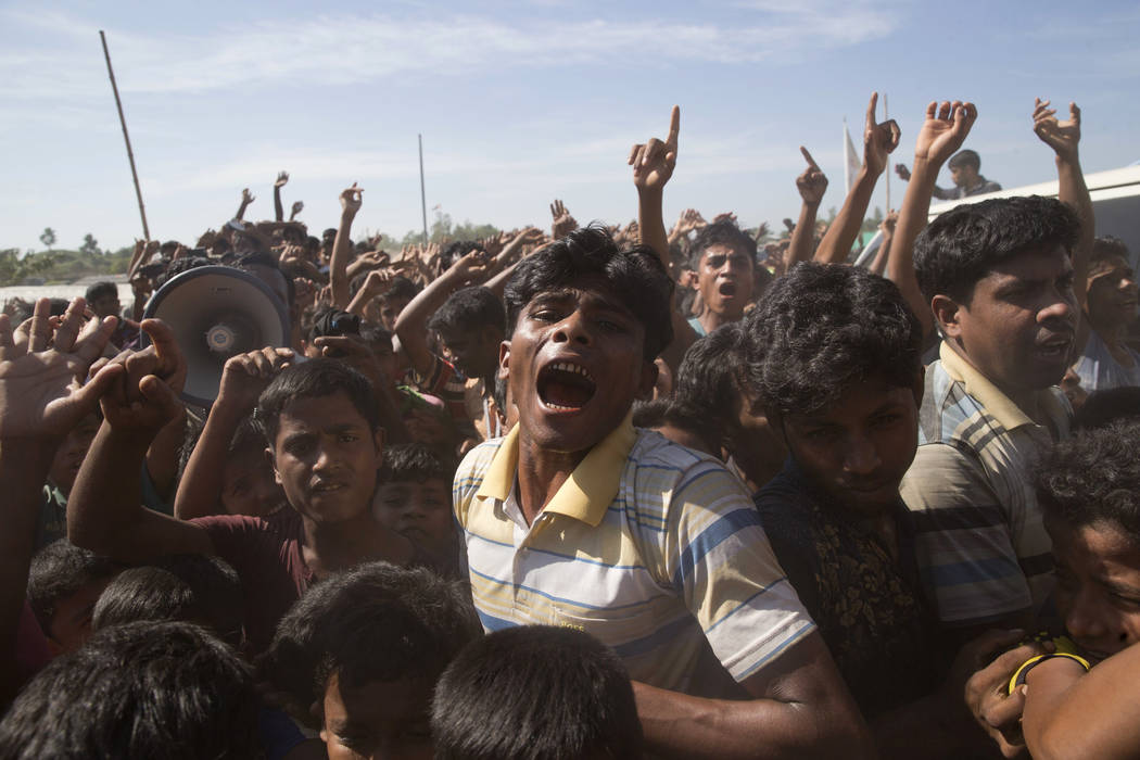 In a file photo dated Thursday, Nov. 15, 2018, Rohingya refugees shout slogans during a protest ...